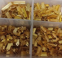 Końcówki do rzemieni w kolorze złotym - metal